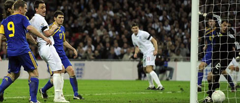 John Terry guides home Steven Gerrard's knock-down to give England all three points against Ukraine.